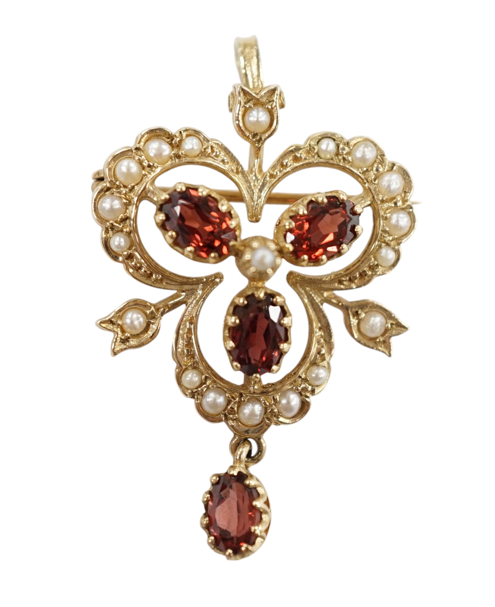 A Victorian style 9ct gold, garnet and seed pearl set drop pendant brooch, overall 39mm, gross weight 5.7 grams. Condition - fair to good